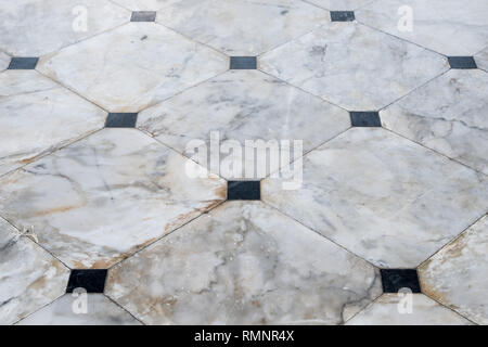 Marble tile floor with the black block for decorated in the living room. Stock Photo