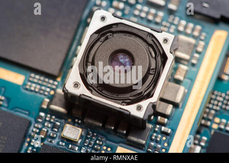 Cell phone camera module with other parts of device, service and repair concept Stock Photo
