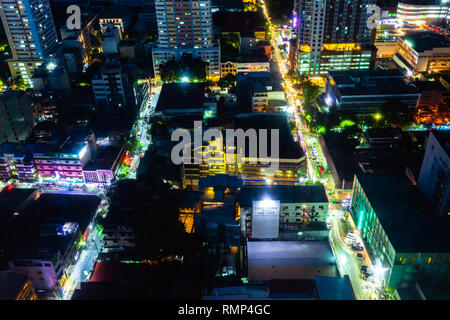 Manila, Philippines - November 11, 2018: Night view of the illuminated streets of the Malate district from above on November 11, 2018, in Metro Manila. Stock Photo