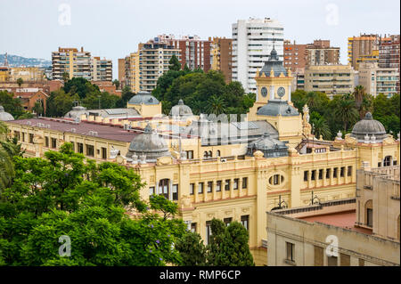 Domed ornate rooftop of historic Malaga Town Hall and modern apartment tower blocks seen from above, Malaga, Andalusia, Spain Stock Photo