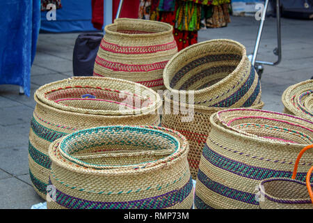 Wicker Baskets at Market lying on the Ground Stock Photo