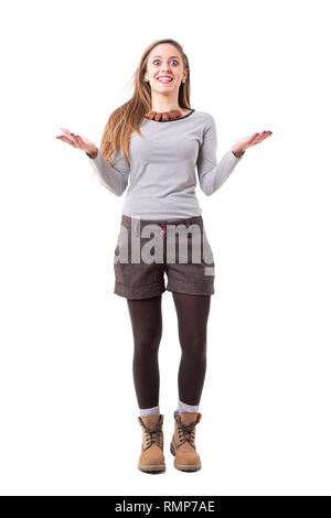 Angry expressive woman yelling while explaining and gesticulating looking at camera. Full body isolated on white background. Stock Photo