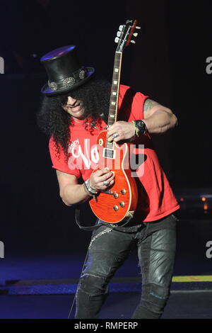 Guitarist and songwriter Saul Hudson, better known by his stage name Slash is shown performing on stage during a 'live' concert appearance with his solo band. Stock Photo