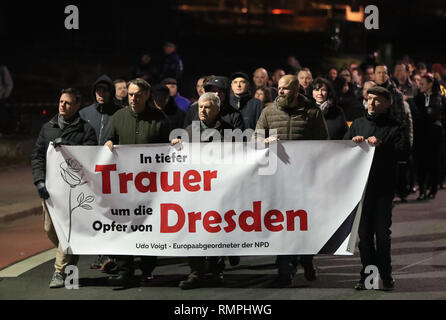 Dresden, Germany. 15th Feb, 2019. Neo-Nazis, led by Udo Voigt (M, NPD), Member of the European Parliament, march through the city. As every year, the right-wing extremists have announced a so-called funeral march in memory of the destruction of the Elbe city by allied bombers in February 1945. Credit: Str./dpa/Alamy Live News Stock Photo