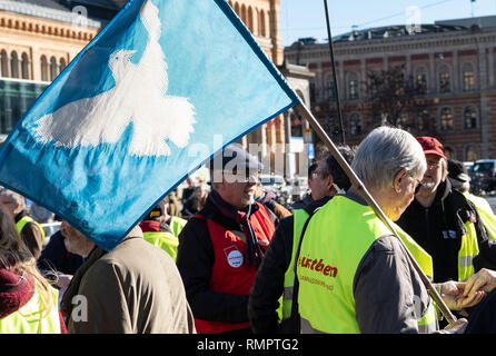 Hannover, Germany. 16th Feb, 2019. The West with the inscription 'Aufstehen' stands for demonstrators of the collection movement 'Aufstehen' in Hanover. The demonstrators are called upon to appear in colourful warning vests, modelled on the French yellow vests. Demonstrations have been announced in at least 14 cities. Credit: Peter Steffen/dpa/Alamy Live News Stock Photo