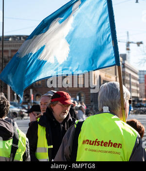 Hannover, Germany. 16th Feb, 2019. The West with the inscription 'Aufstehen' stands for demonstrators of the collection movement 'Aufstehen' in Hanover. The demonstrators are called upon to appear in colourful warning vests, modelled on the French yellow vests. Demonstrations have been announced in at least 14 cities. Credit: Peter Steffen/dpa/Alamy Live News Stock Photo