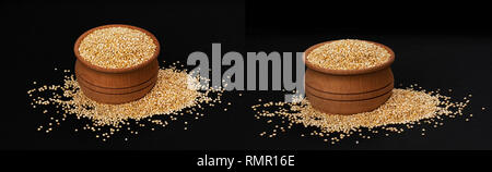 Quinoa seeds. Bowl of healthy white quinoa grains isolated on black background, close-up Stock Photo