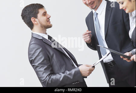 business people discussion over documents in empty office Stock Photo