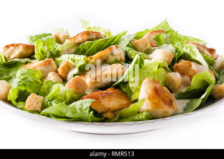 Caesar salad with lettuce,chicken and croutons isolated on white background. Close up Stock Photo