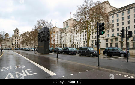 LONDON WHITEHALL NEAR TO MEMORIAL TO WOMEN OF WORLD WAR TWO A BLACK CAB TAXI DEMONSTRATION ON FEBRUARY 8 2019 A LONG LINE OF CARS Stock Photo