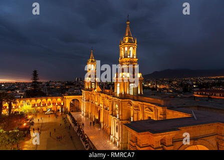 Cityscape of Arequipa after sunset with the illuminated Cathedral and the Plaza de Armas main square, Peru. Stock Photo