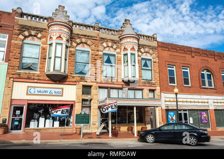 Guthrie, Oklahoma, United States of America - January 19, 2017. Exterior view of De Steiguer Building in Guthrie, OK, with commercial properties and c Stock Photo