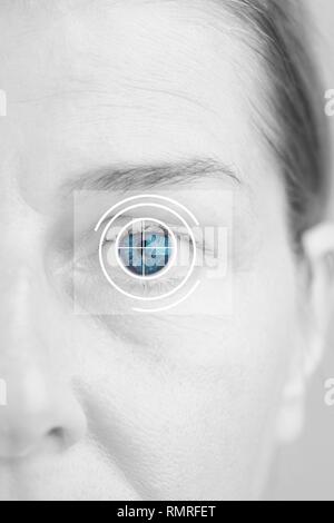 Human eye with target sign, conceptual image. Stock Photo