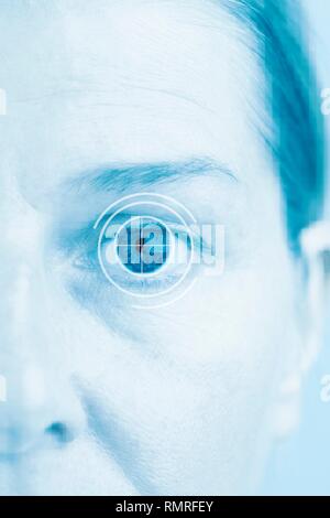 Human eye with target sign, conceptual image. Stock Photo