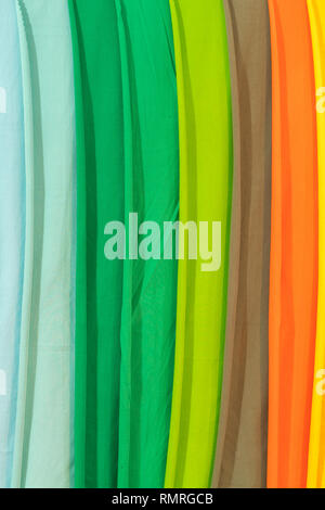 Photo picture Samples of colored cloth background texture. crumpled fabric. verticak photo. Stock Photo