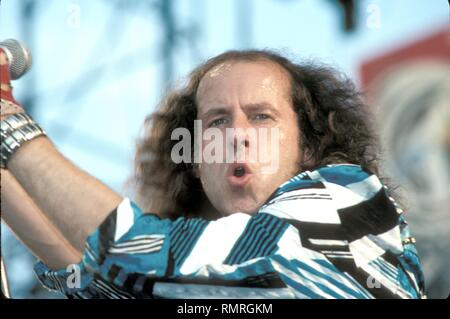 Singer Klaus Meine of the heavy metal band The Scorpions is shown performing on stage during the Monsters of Rock tour back in 1988. Stock Photo