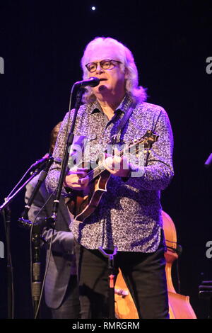 Bluegrass singer, musician, producer and composer Ricky Skaggs is shown performing on stage during a 'live' concert appearance with Kentucky Thunder. Stock Photo