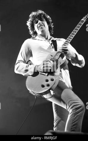 Guitarist Dean DeLeo of the rock band the Stone Temple Pilots is shown performing on stage during a 'live' concert appearance. Stock Photo