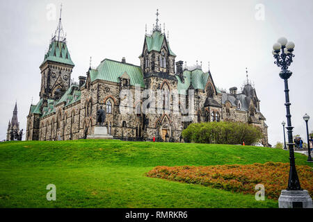 Ottawa, Canada - May 14, 2017. Parliament Buildings in Ottawa, Canada. The historic, neo-Gothic Buildings stand tall on a hill overlooking the majesti Stock Photo