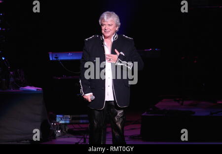 Australian vocalist Russell Hitchcock of Air Supply is shown performing 'live' in concert. Stock Photo