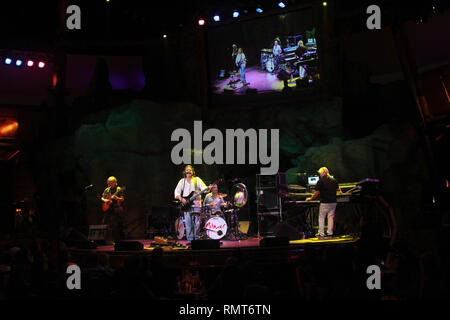 Carl Palmer, Steve Howe, and John Wetton ( pictured L-R ) of