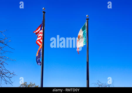 Mexican and American Flags at the Arizona Border between the two countries Stock Photo