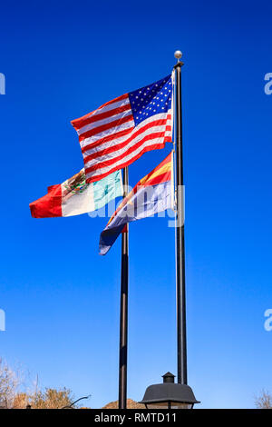 Mexican, American and Arizona state Flags at the Border between the two countries Stock Photo