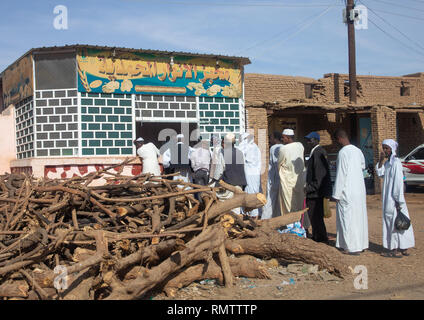 Sudanese people queue on line at a bakery during the crisis, Northern State, Karima, Sudan Stock Photo