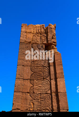 Apedemak as a coiled snake with lion head in temple of Apedemak, Nubia, Naqa, Sudan Stock Photo