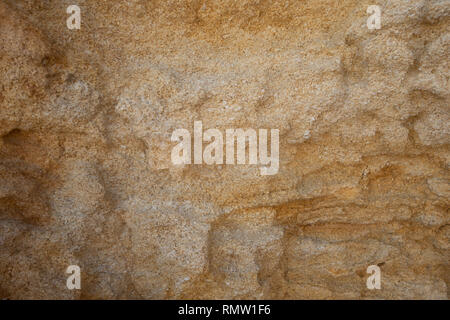 Sea sand texture made of shell and stone pieces. Seamless texture.The texture of sandstone. Background made of sand and seashells. Stock Photo