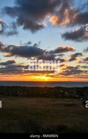 Amazing colored landscape during sunset at the seaside close to Geraldton in Western Australia Stock Photo