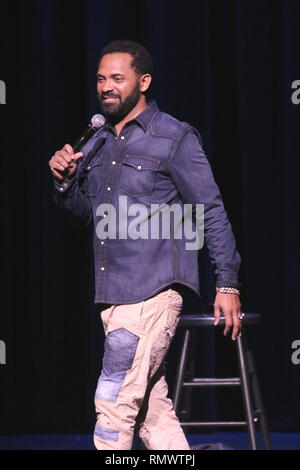 Stand up comedian, actor, film producer, writer and rapper Mike Epps is shown performing on stage during a 'live' concert appearance. Stock Photo