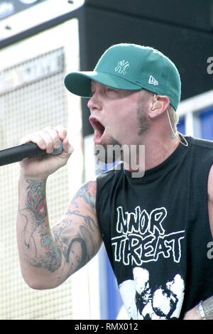 Vocalist Fred Durst of the nu metal band Limp Bizkit is shown performing on stage during a 'live' concert appearance. Stock Photo