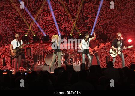 Little Big Town band members Jimi Westbrook, Kimberly Schlapman, Karen Fairchild and Phillip Sweet, are shown performing on stage during a 'live' concert appearance. Stock Photo