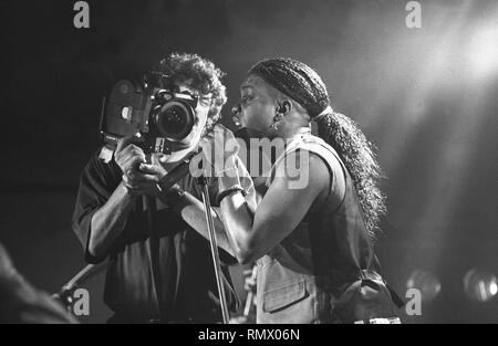 Singer Corey Glover is shown performing on stage during a 'live' concert appearance with Living Colour. Stock Photo
