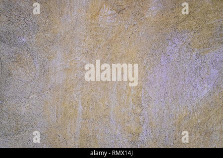 Yellow urban stucco wall texture background, tropical style. Stock Photo