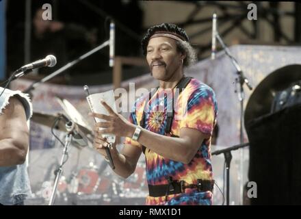 A Neville Brothers band member is shown performing on stage during a 'live' concert appearance. Stock Photo