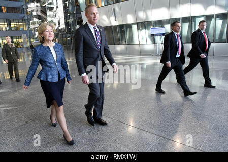 U.S. Acting Secretary of Defense Patrick M. Shanahan departs NATO headquarters with the permanent representative of the United States to the North Atlantic Treaty Organization, U.S. Ambassador Kay Bailey Hutchison, at the conclusion of a two-day defense ministerial, Brussels, Belgium, Feb. 14, 2019. (DoD photo by Lisa Ferdinando) Stock Photo