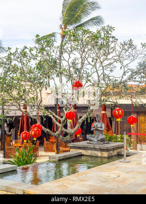 Chinese red lanterns over a pool in Ayana Resort and Spa Jimbaran Bali Indonesia. Stock Photo