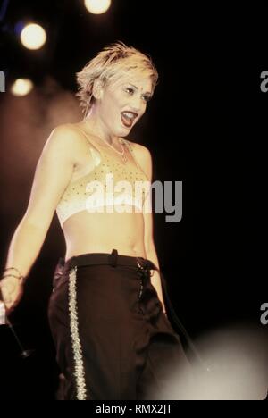 Singer Gwen Stefani of the rock band No Doubt is shown performing on stage during a 'live' concert appearance. Stock Photo