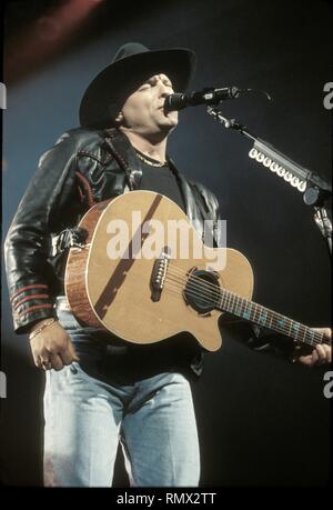 Country music star John Michael Montgomery, brother of Eddie Montgomery, one half of the duo Montgomery Gentry, is shown performing on stage during a 'live' concert appearance. Stock Photo