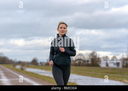 Fit Women Jogging Outdoors And Living A Healthy Lifestyle Stock Photo,  Picture and Royalty Free Image. Image 46799106.