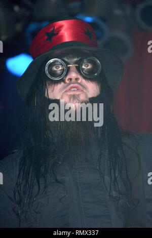 Guitarist Greg Tribbett of the rock band Mudvayne is shown performing on stage during a 'live' concert appearance. Stock Photo