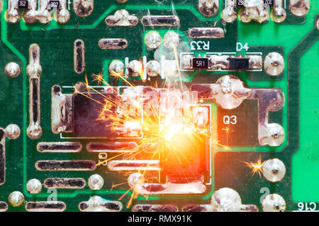Electricity circuit short burn out overheat chip on the PCB. Stock Photo
