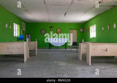 The green interior of a small church in the town of Boquillas del Carmen in Mexico. Stock Photo