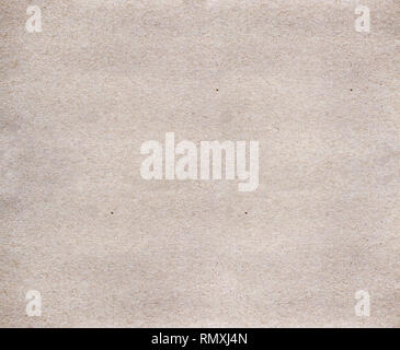 Beige, brown background is backed from cardboard, recycled paper, top view Stock Photo