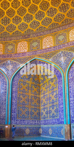 ISFAHAN, IRAN - OCTOBER 21, 2017: The picturesque tile patterns in prayer hall of Sheikh Lotfollah mosque - the outstanding architectural landmark of  Stock Photo