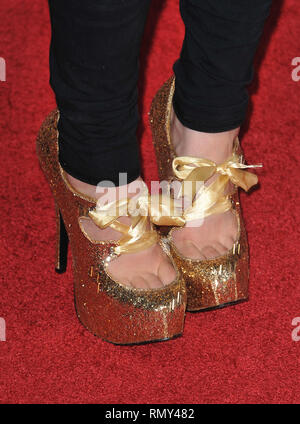 Kat Von D - Jackass 3D Premiere at the Chinese Theatre In Los Angeles.Kat Von D 21  Event in Hollywood Life - California, Red Carpet and backstage, movie celebrities, TV celebrities, Music celebrities, Topix, Bestof, Arts Culture and Entertainment, Photography,  inquiry tsuni@Gamma-USA.com , Credit Tsuni / USA,  accessory wear by people on event. shoes, jewelery, ring, earring, bag ambience and others. from 2010 Stock Photo