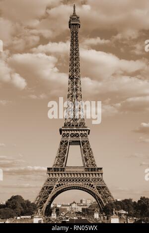 eiffel tower symbol of the city of paris with Sepia Toned effect and the clouds in the sky Stock Photo