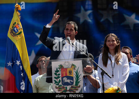 Caracas, Venezuela. 2nd Feb, 2019. Venezuelan opposition leader and self-proclaimed interim president Juan Guaido and his wife Fabiana Rosales react d Stock Photo